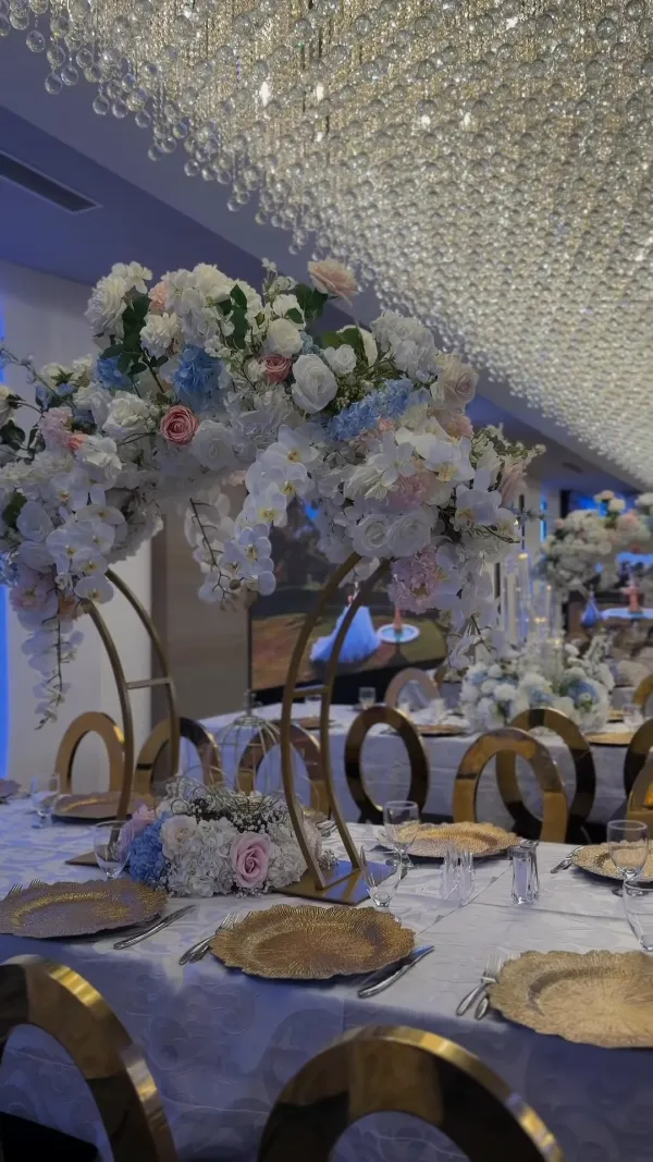 Crystal ceiling above floral centerpieces